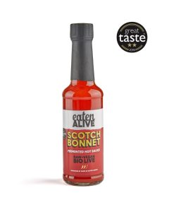 Eaten Alive Scotch Bonnet hot sauce bottle for spicy dishes.